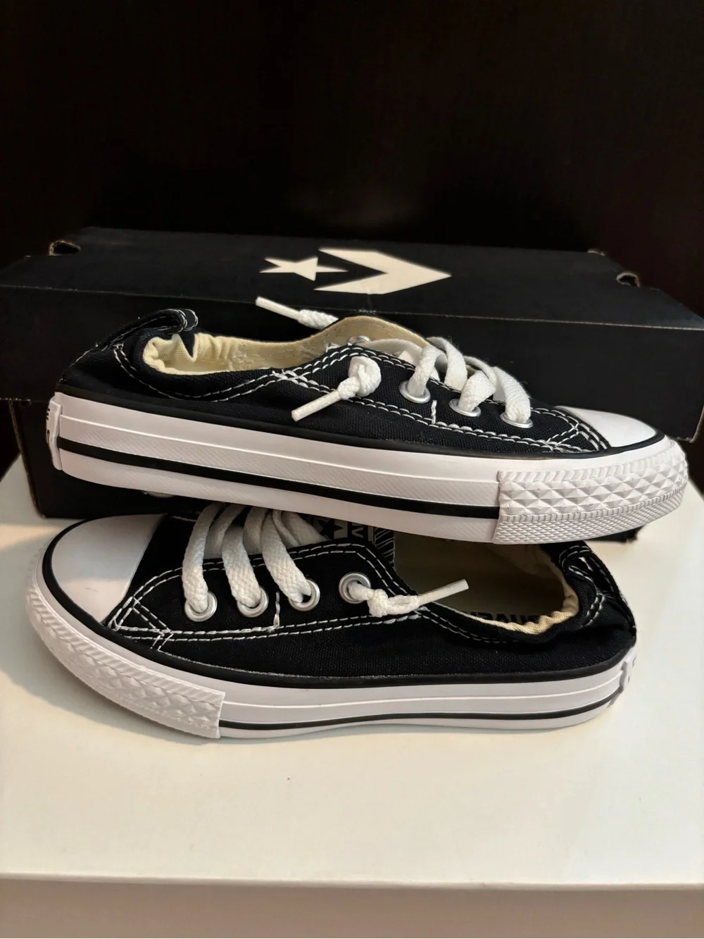 Kid’s Converse Black and White Unisex Low-Top Canvas Sneaker Pair